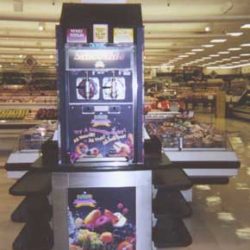 Self-serve smoothie point of sale merchandiser kiosk in supermarket