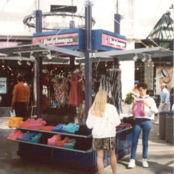Outside rmu has shade awnings, weatherproof, retail merchandise display kiosk