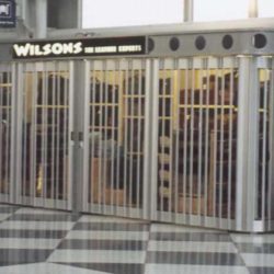 Airport retail shopping kiosk with security doors