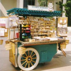 Custom, painted wood, retail cart with balloon tires on wagon wheels