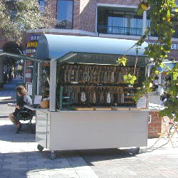 Outdoor weatherproof mobile retail push cart