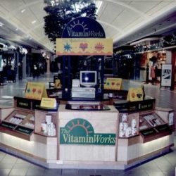 Nutritional supplements and vitamin merchandising sales kiosk in shopping center