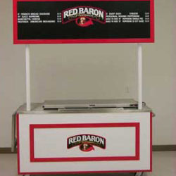 Red Barron Pizza vending cart with menu and pizza warmer