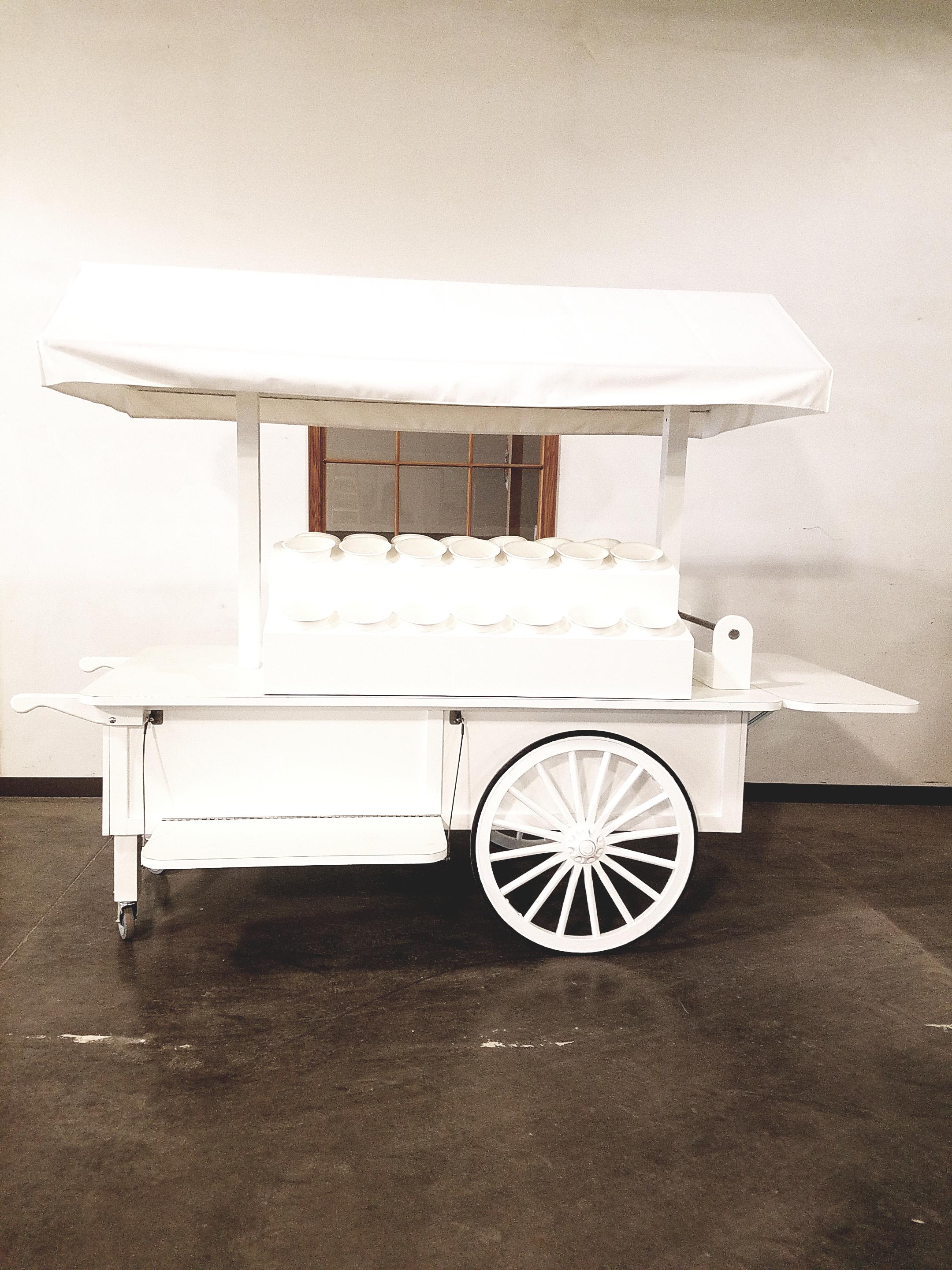 Neiman Marcus Flower Wagon Wheel Cart